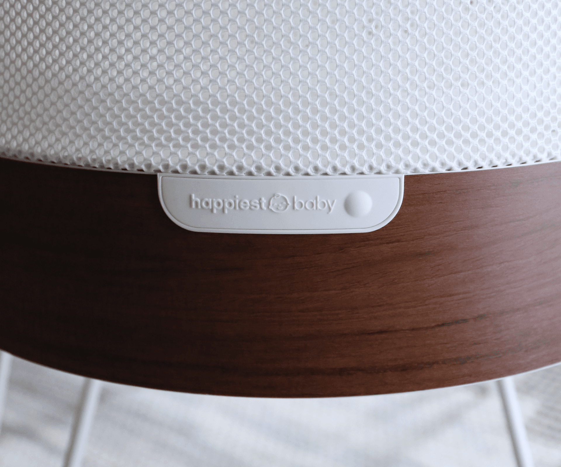 The start button for the SNOO bassinet