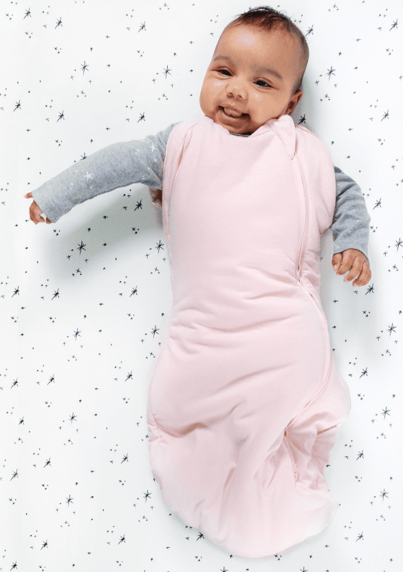 Baby in sleepea with arms out