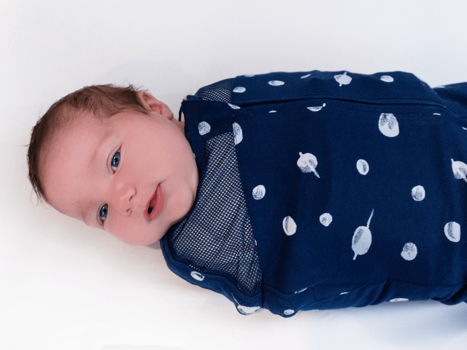 Baby in Sleepea with zipper hidden by zipper hood