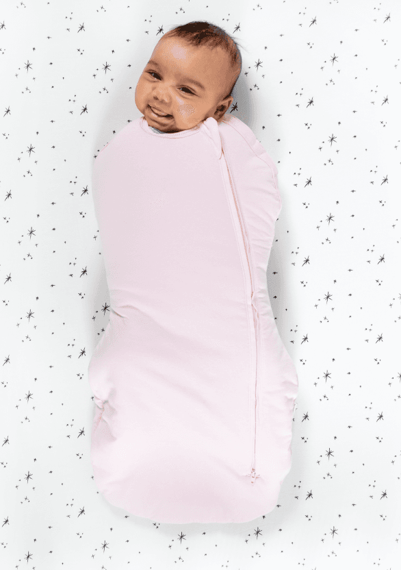 Baby in zipped up sleepea